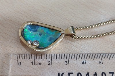Lot 2078 - An Opal and Diamond Pendant on Chain the...