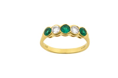 Lot 2095 - An 18 Carat Gold Emerald and Diamond Five...