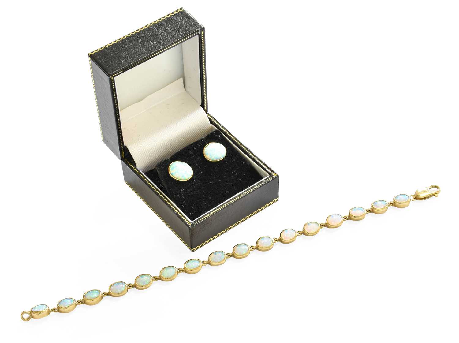 Lot 53 - A 9 Carat Gold Opal Bracelet, sixteen chain...