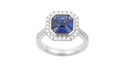 Lot 2276 - An 18 Carat White Gold Sapphire and Diamond...