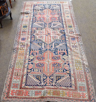 Lot 1104 - Akstafa Long Rug, the midnight blue field with...