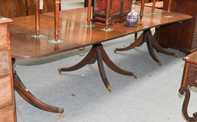 Lot 1309 - George III Mahogany Triple Pillar Dining Table,...