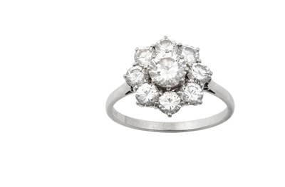 Lot 2290 - A Diamond Cluster Ring the central raised...