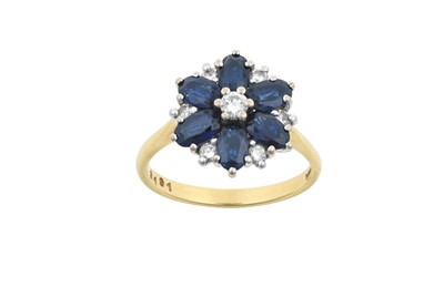 Lot 2163 - An 18 Carat Gold Sapphire and Diamond Cluster...