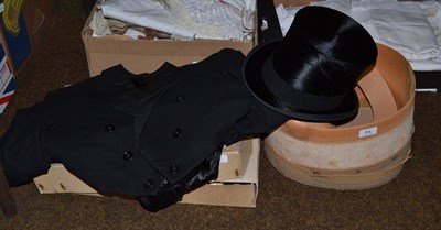 Lot 64 - A black silk top hat, boxed, a gentleman's tailcoat, waistcoat and trousers