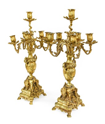 Lot 243 - A Pair of Gilt Bronze Six-Light Candelabra, in...