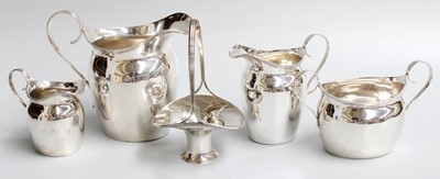 Lot 151 - A Graduated Set of Three Cream-Jugs With a...