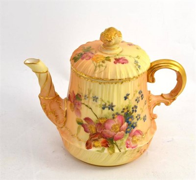 Lot 73 - A Royal Worcester teapot and cover, decorated with flowers on a blush ivory ground, 14cm