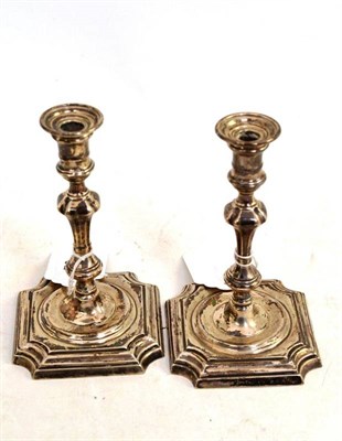 Lot 78 - Pair of Victorian loaded silver tapersticks