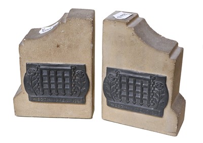 Lot 210 - A Pair of WWII Carved Stone Bookends, bareing...