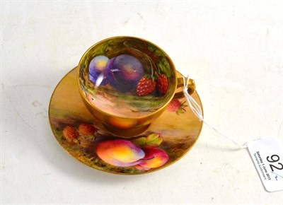 Lot 92 - A Royal Worcester small cup and saucer painted with fruits, cup signed W Hale, saucer signed R...
