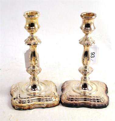 Lot 93 - Pair of silver loaded candlesticks by C J Vandes