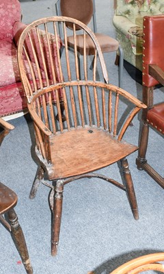 Lot 1334 - A 19th Century Ash Stickback Windsor Armchair