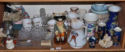 Lot 102 - A shelf of decorative ceramics, glass and ornamental items including three Carlton ware vases,...