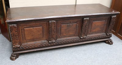 Lot 1123 - An Oak and Walnut Cassone, panelled front with...