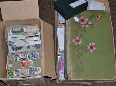 Lot 110 - A quantity of postcards in two albums and loose; and a quantity of cigarette and trade cards