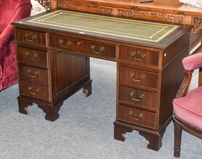 Lot 1203 - A Reproduction Leather Kneehole Pedestal Desk,...