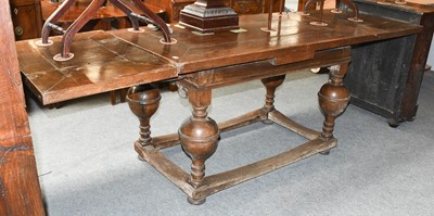 Lot 1295 - A 17th Century Style Oak Extending Refectory...