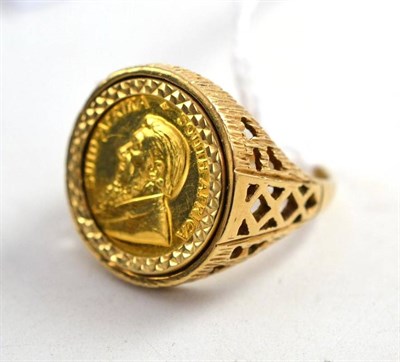 Lot 132 - A 1/10 Kruggerand coin mounted in 9ct gold as a ring