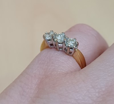 Lot 2021 - An 18 Carat Gold Diamond Three Stone Ring the...