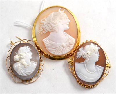 Lot 135 - Two cameo brooches depicting Diana the Huntress, and another (one in a frame marked '9CT')