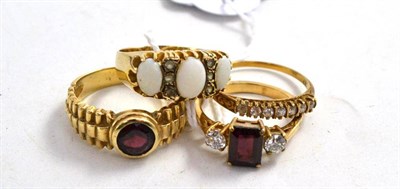 Lot 143 - Four 9ct gold gem set rings
