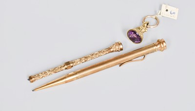 Lot 86 - A Gold Pencil, 9ct, engine-turned and with...