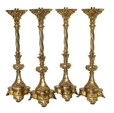 Lot 213 - A Set of Four Gilt-Bronze Candle Stands, in...