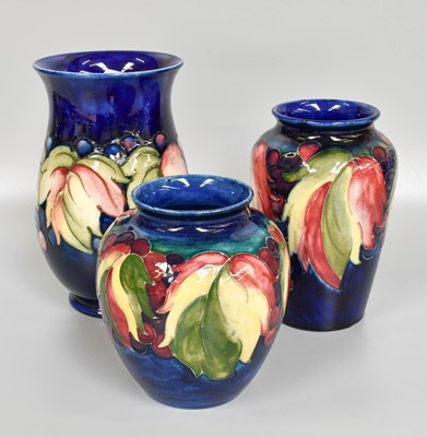 Lot 249 - A Walter Moorcroft "Leaves and Berries"...