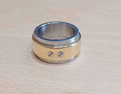 Lot 2187 - A Bi-Colour 'Santos' Ring, by Cartier the...
