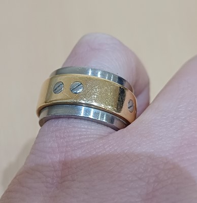 Lot 2187 - A Bi-Colour 'Santos' Ring, by Cartier the...