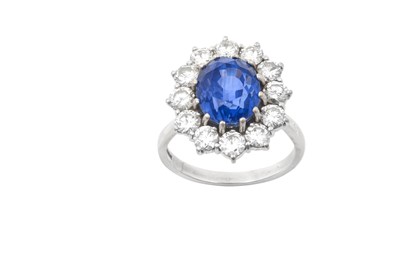 Lot 2285 - An 18 Carat White Gold Sapphire and Diamond...