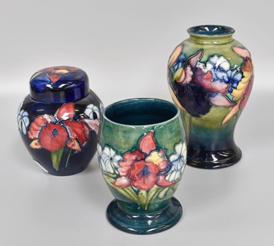 Lot 255 - A Walter Moorcroft "Orchids and Spring Flowers"...