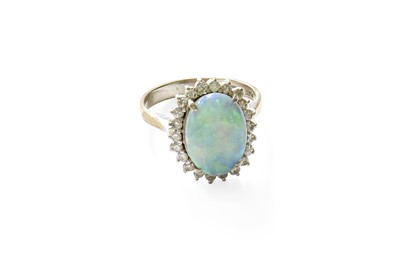 Lot 446 - An 14 Carat White Gold Opal and Diamond...