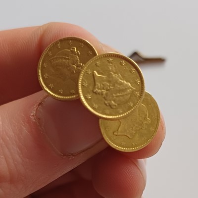 Lot 52 - Two Buttons, each comprising of three $1 coins