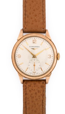 Lot 2490 - Longines: A 9 Carat Gold Wristwatch, signed...