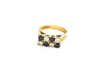 Lot 59 - An 18 Carat Gold Sapphire and Diamond Ring,...