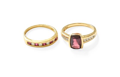 Lot 436 - An 18 Carat Gold Garnet and Diamond Ring, the...