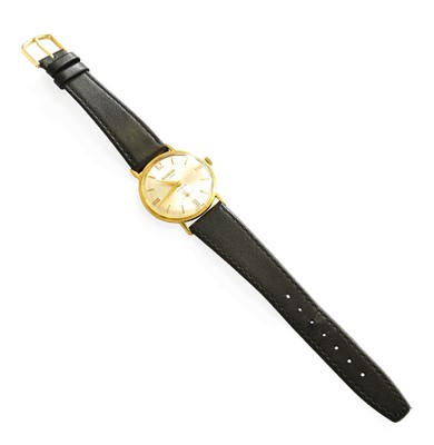 Lot 14 - An 18 Carat Gold Wristwatch, signed Slogan