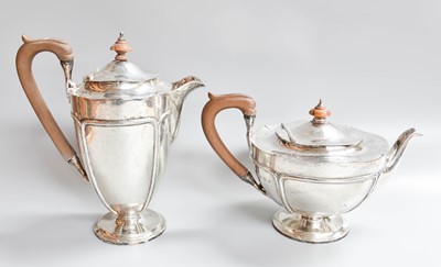 Lot 6 - A George V Silver Teapot and Hot-Water Jug, by...