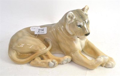 Lot 214 - A Royal Copenhagen figure of a recumbent lioness