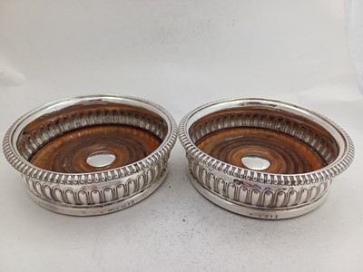 Lot A Pair of George III Silver Wine-Coasters