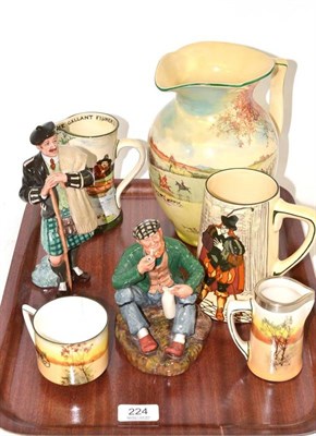 Lot 224 - Five Doulton series ware pieces and two figures