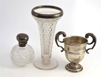 Lot 227 - Silver mounted cut glass scent bottle; twin handled silver trophy cup; and a silver mounted...