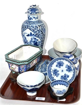 Lot 231 - A Canton enamel small rectangular jardiniere on a hardwood stand, a quantity Chinese blue and white