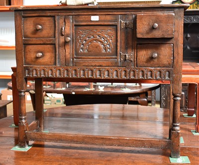 Lot 1255 - A Titchmarsh and Goodwin Style Carved Oak...