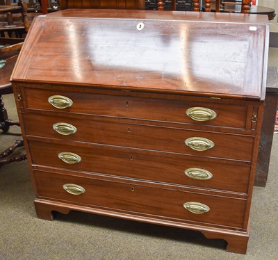 Lot 1317 - A George III Mahogany Bureau, with fall flap,...