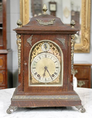 Lot 1272 - An Oak Cased Table Clock, twin train 8 day...