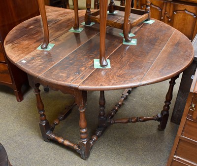 Lot 1264 - A 17th century Gateleg Table, oval top, twin...