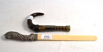 Lot 256 - Silver and ivory page turner; a horn and silver parasol handle